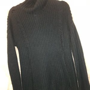 Cozy dark teal sweater with stylish slits